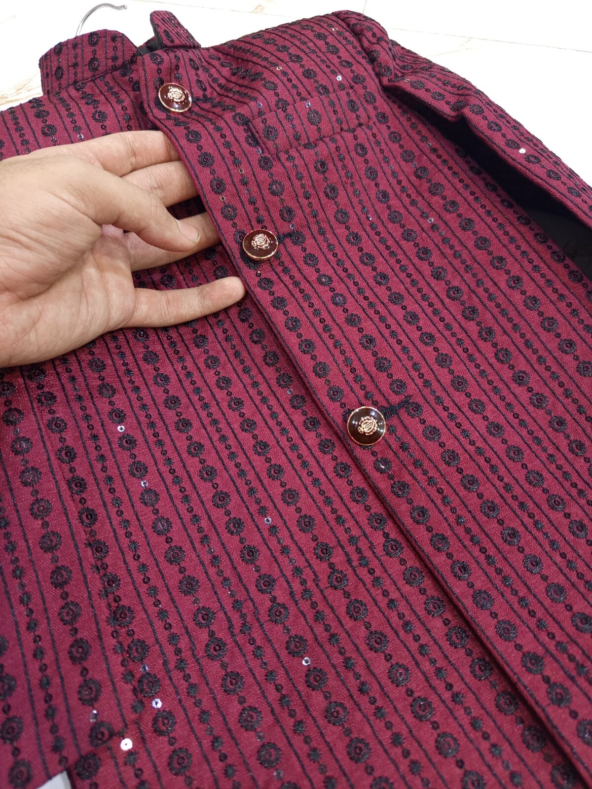 Real maroon sherwani fabric with black floral embroidery and sequin detail