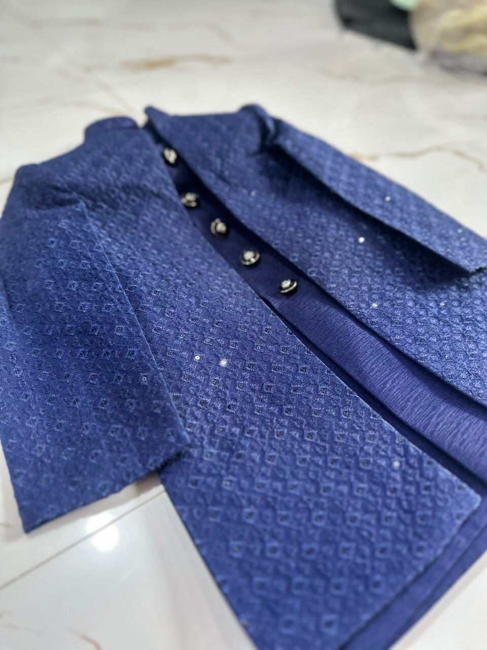 Royal Sapphire Blue Sherwani real article – textured fabric and button detail